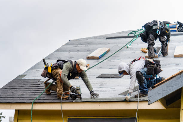 Professional Flat Roof Repair technician working in Mapleton, OR